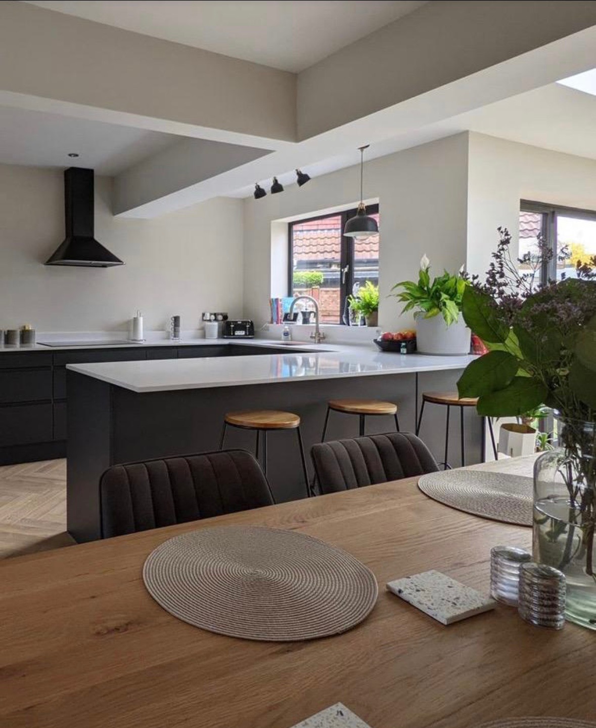 Aigburth property after full refurbishment showing dark open-plan kitchen